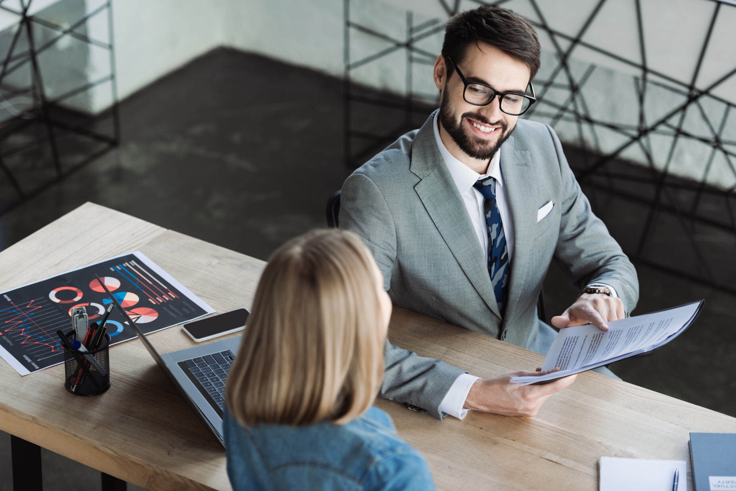 A collaborative one-on-one discussion highlighting entry-level sales jobs