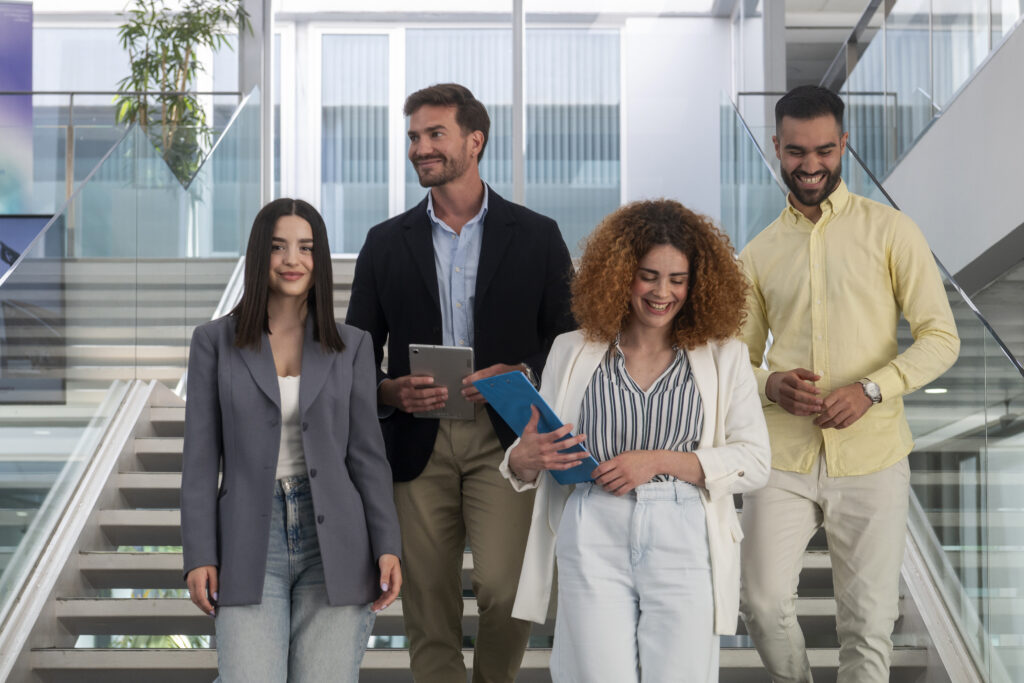 Ambitious professionals moving forward together, reflecting growth and momentum in a marketing career path.